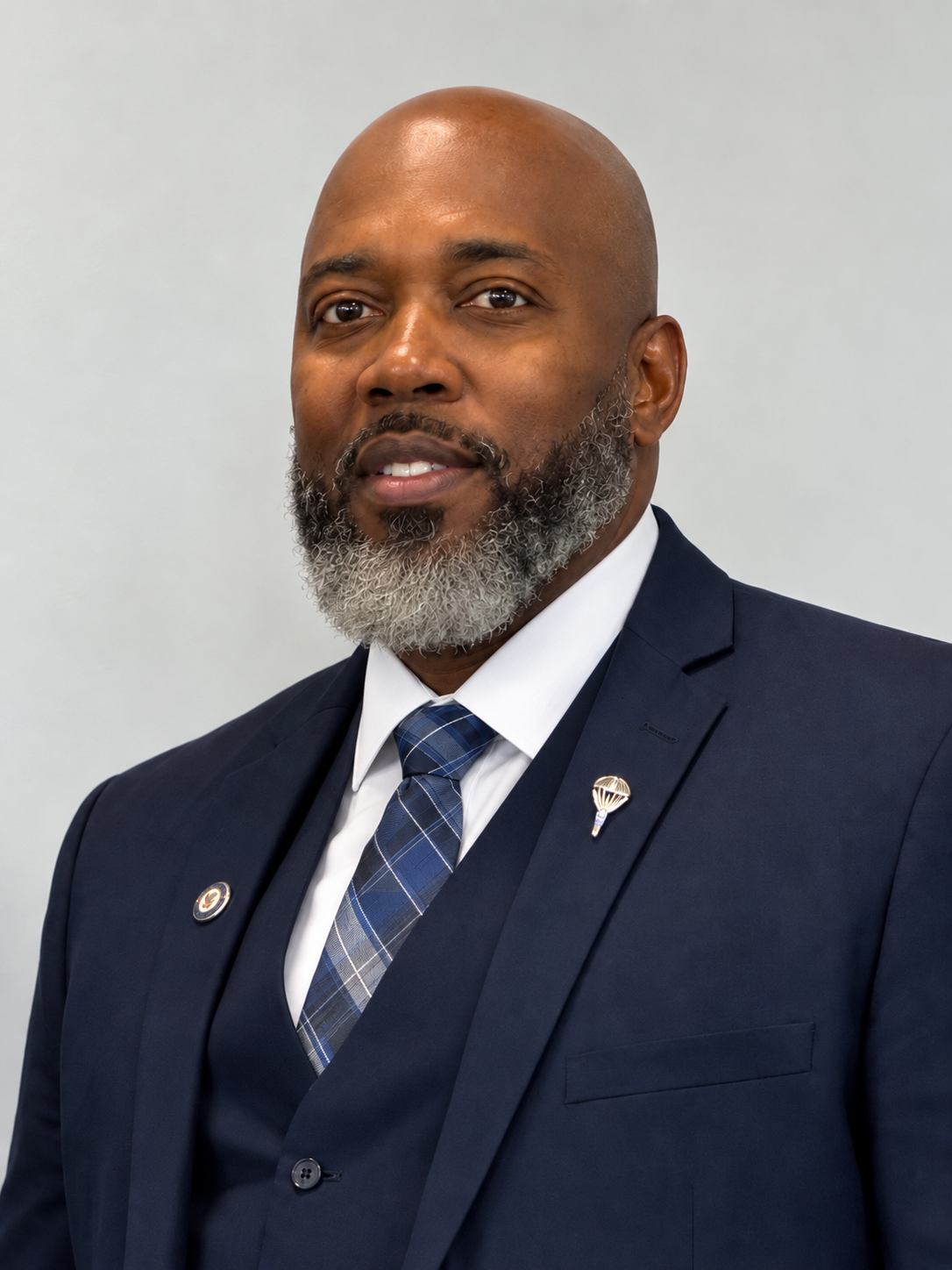 Martin Freddy Celestine wearing a navy suit